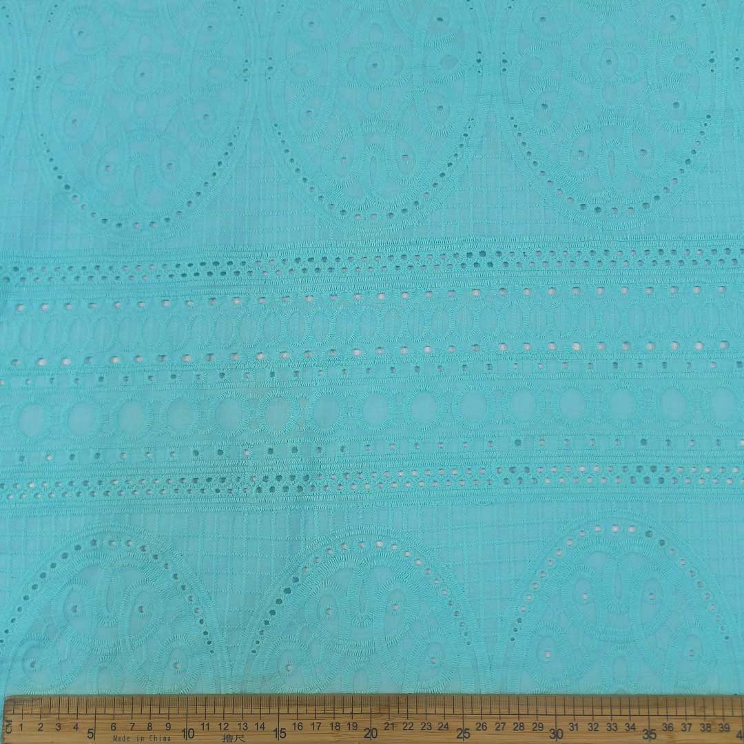DR089899-7_1.jpg Anglaise 100% Cotton-7 fabric, perfect for a variety of fashion and home décor projects, offering softness, durability, and ease of maintenance.