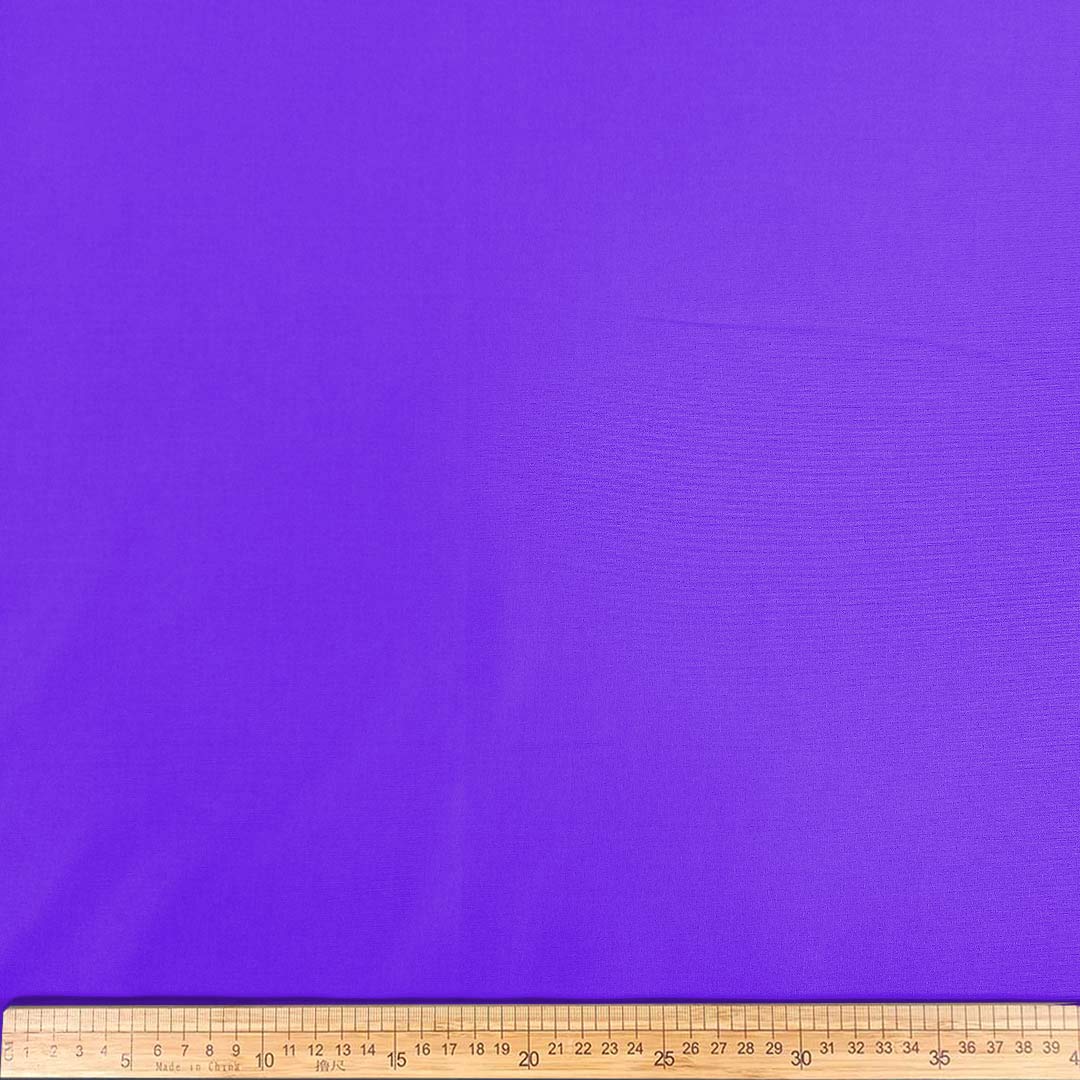 DR08931-41_1.jpg Plain Scuba A821 Purple fabric showcasing a smooth, stretchy texture and a rich, bold purple color for versatile fashion and design projects.