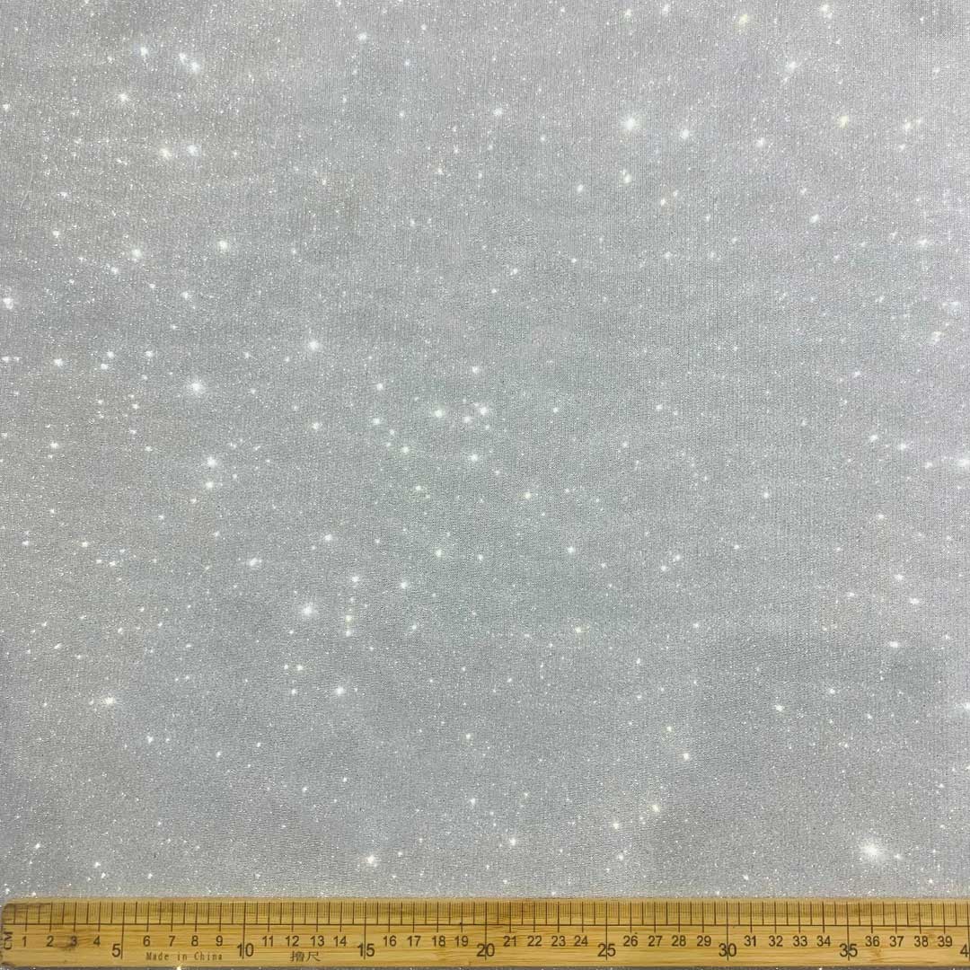 DR08091-2_1.jpg Galaxy Scuba Silver, a chic silver accessory made from durable scuba fabric, perfect for any occasion.