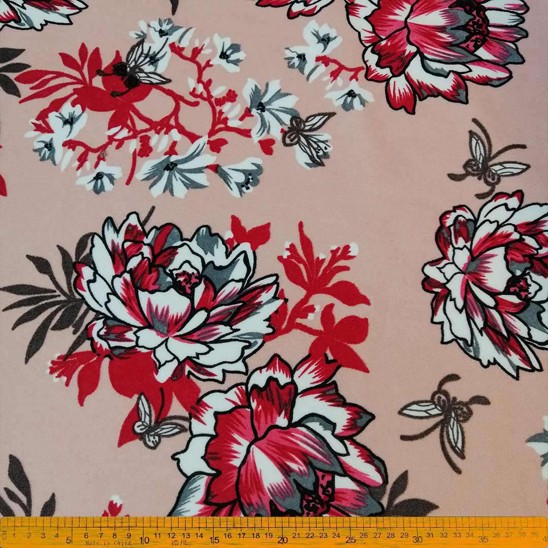 DR0925-11_1.jpg Scuba Crepe Peach Floral Printed – Elegant peach fabric with a delicate floral print, ideal for creating chic garments, home décor, and accessories, offering sophistication and lasting durability.