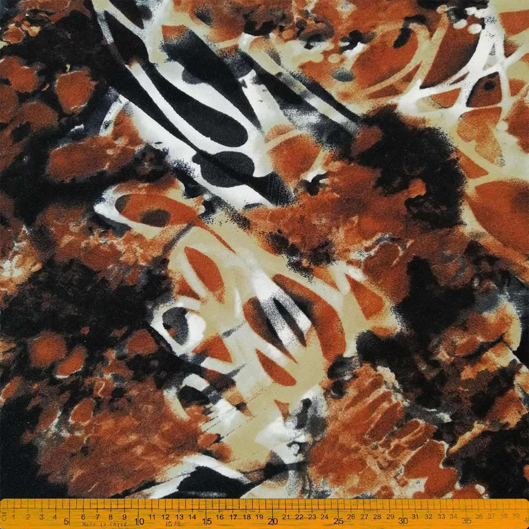 DR0925-13_1.jpg Scuba Crepe Burnt Red Abstract Printed – Bold burnt red fabric with abstract print, perfect for creating stylish garments, home décor, and accessories, offering elegance and modern flair with lasting durability.