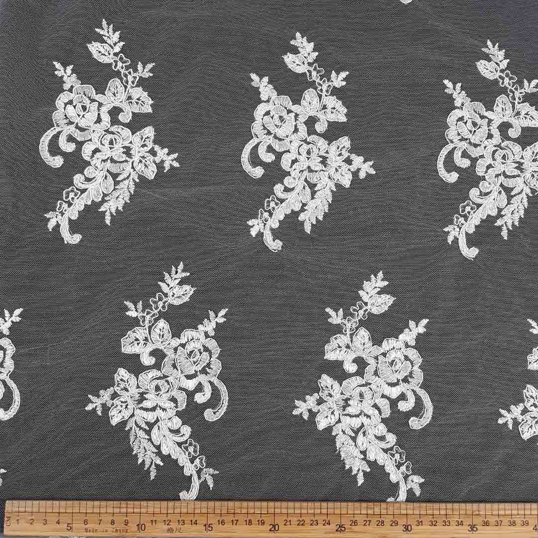 BR020026-3_1.jpg Tulle Small Flower Allover PK1292 – Elegant tulle fabric with small floral patterns, perfect for fashion, home décor, and event styling, adding a delicate, airy touch to your designs.