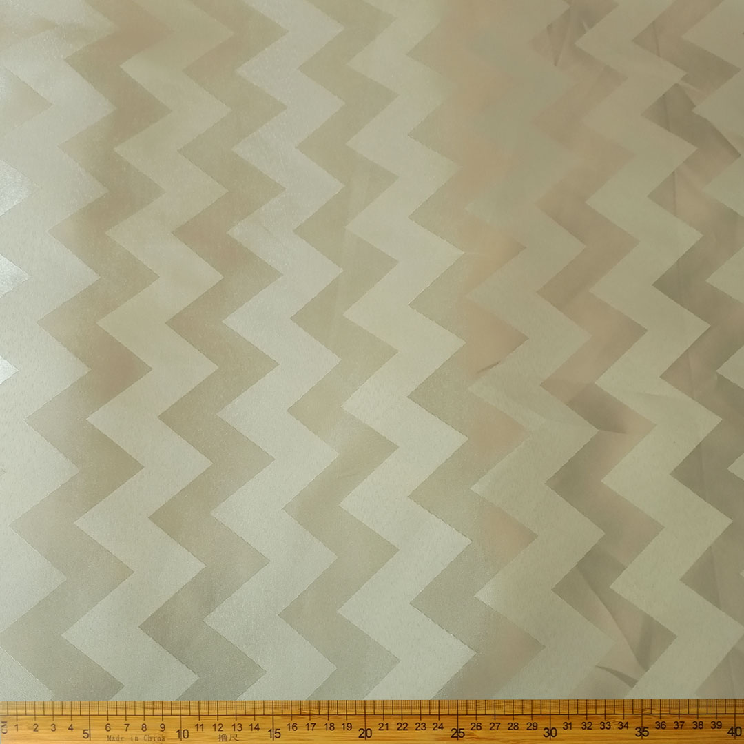 CU021016-3_1.jpg Melange Tabling Zig Zag 280cm Gold fabric with a striking zig-zag pattern, ideal for large tables and adding a touch of elegance to dining decor.