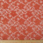 Blossom Lace & Scallop fabric with floral lace and scalloped edge, perfect for creating elegant garments and home decor items.