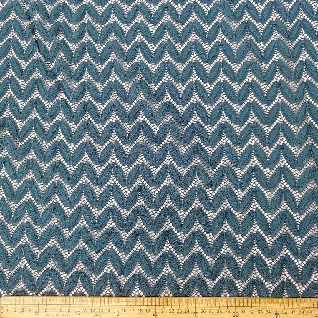 DR08706_1.jpg Stretch Lace 150cm fabric with an intricate lace pattern, offering flexibility and comfort, perfect for stylish clothing and home decor projects.