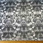 Scuba Printed 150cm -10 fabric with a bold print, ideal for versatile projects like fashion and home decor. Durable and stretchy for a comfortable fit.