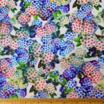 Scuba Printed 150cm -14 fabric with a bold print, smooth texture, and stretchy design for fashionable projects.