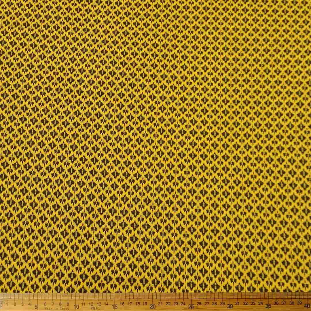 DR093009-035_1.jpg Knitted Jacquard Ethnic Mustard 13512 fabric with a detailed ethnic pattern in mustard, ideal for fashion and home decor projects.