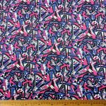 Scuba Digital Print fabric with a blue, pink, black, and white abstract design, ideal for fashion, home décor, and upholstery projects.