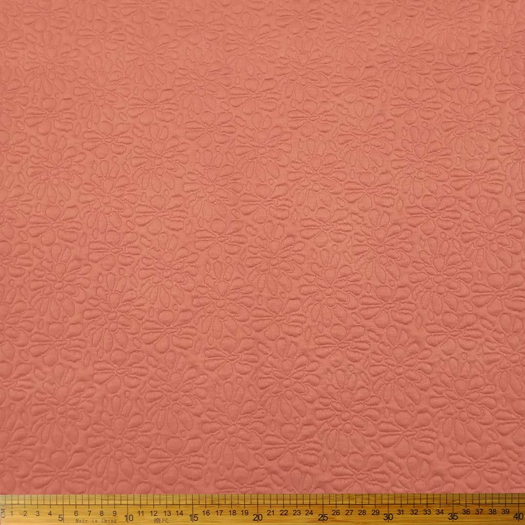 DR15305-012_1.jpg Knitted Jacquard Flower Pink 15305/012 fabric with a floral pattern in vibrant pink, ideal for clothing and home decor.