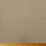 Knitted Jacquard Flower Sand 15305/052 fabric with a floral pattern in soft sand color, ideal for home décor, fashion, and upholstery projects.